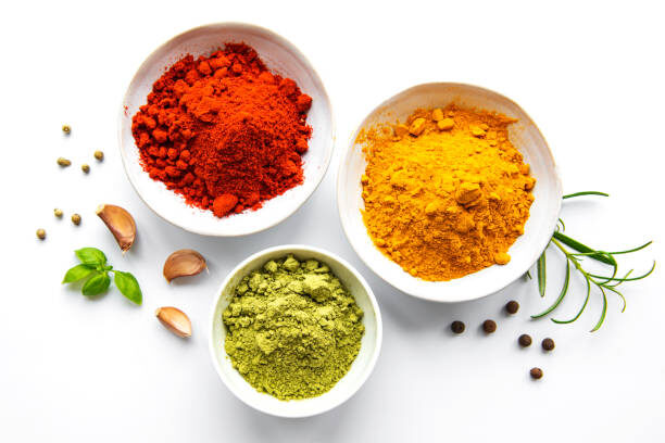Various spices isolated on white background, top view